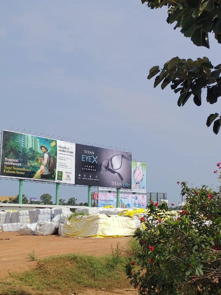 Titan EyeX launch hoarding on a city street